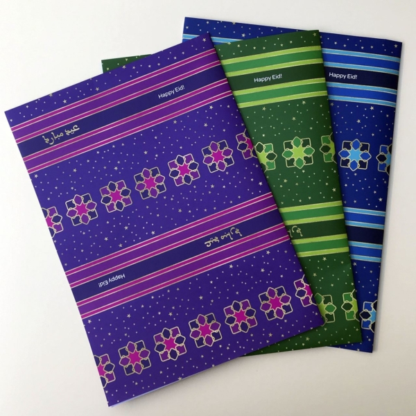 Happy Eid wrapping paper - Available in a blue, a green and a as shown here a purple version. Matching gift tags are also available.