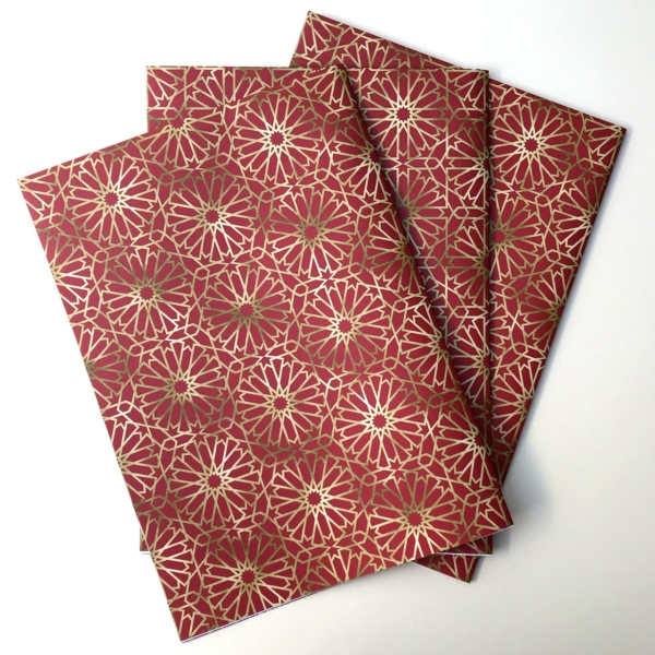 Marrakesh wrapping paper - Red and gold effect. Matching gift tags are also available.